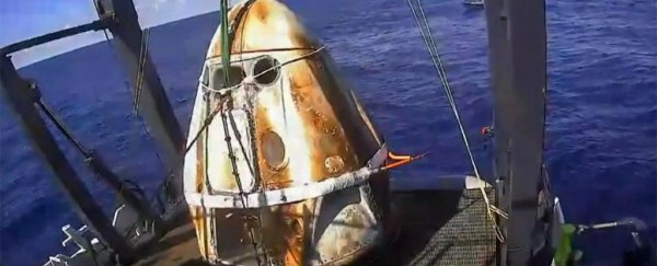 An old looking spacecraft on a boat