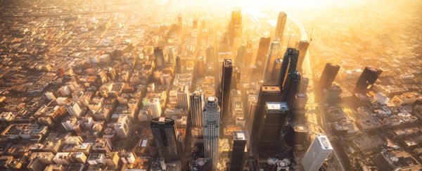 Aerial view of a city bathed in light