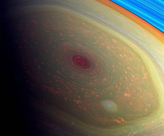 false colour image of hexagonal storm on saturn