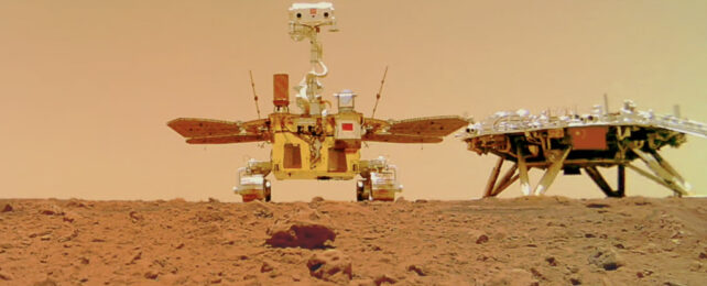 China's first Mars rover Zhurong with its landing platform, Tianwen-1 lander, pictured on the surface of Mars.